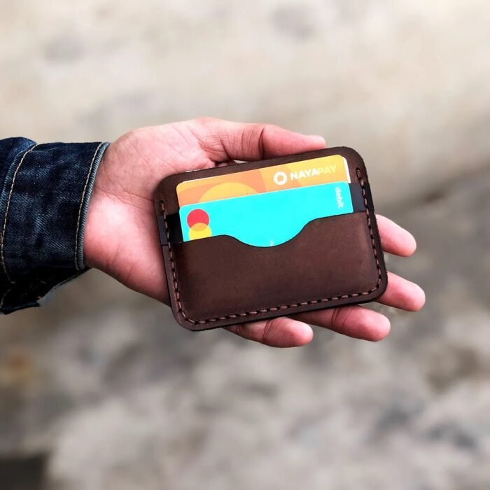 Hand-stitched using durable waxed thread and made from full-grain cowhide leather, this cardholder is perfect for carrying essential cards and a bit of cash without bulk. Ideal for everyday use or as a thoughtful birthday gift for him. themarkleather.co.uk themarkleather.com themarkleather